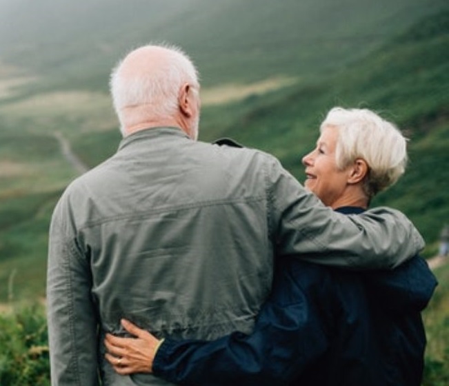 Couple at an overlook watching sunset