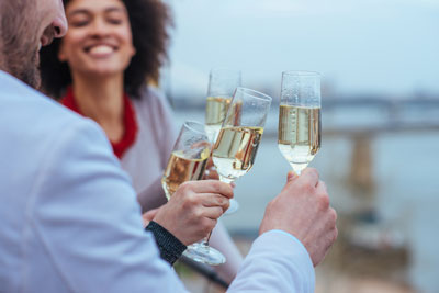 mbakerlaw.com-high-net-worth-estates Family With Baby Daughter In Kitchen Using Laptop On Counter